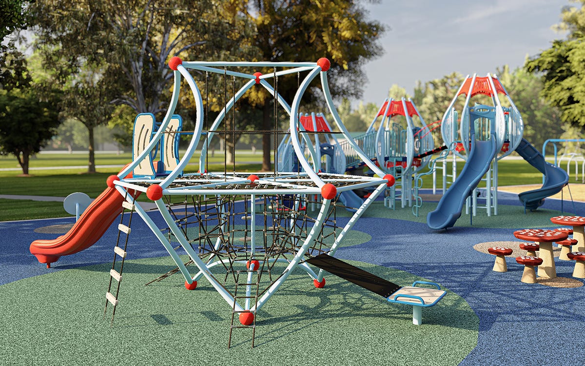 Vista Cube rope climber with surrounding playground equipment