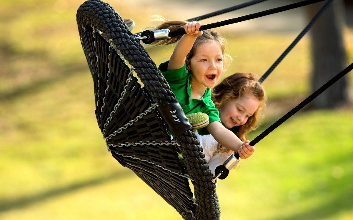 Freestanding play activities that complement a Modern City playground
